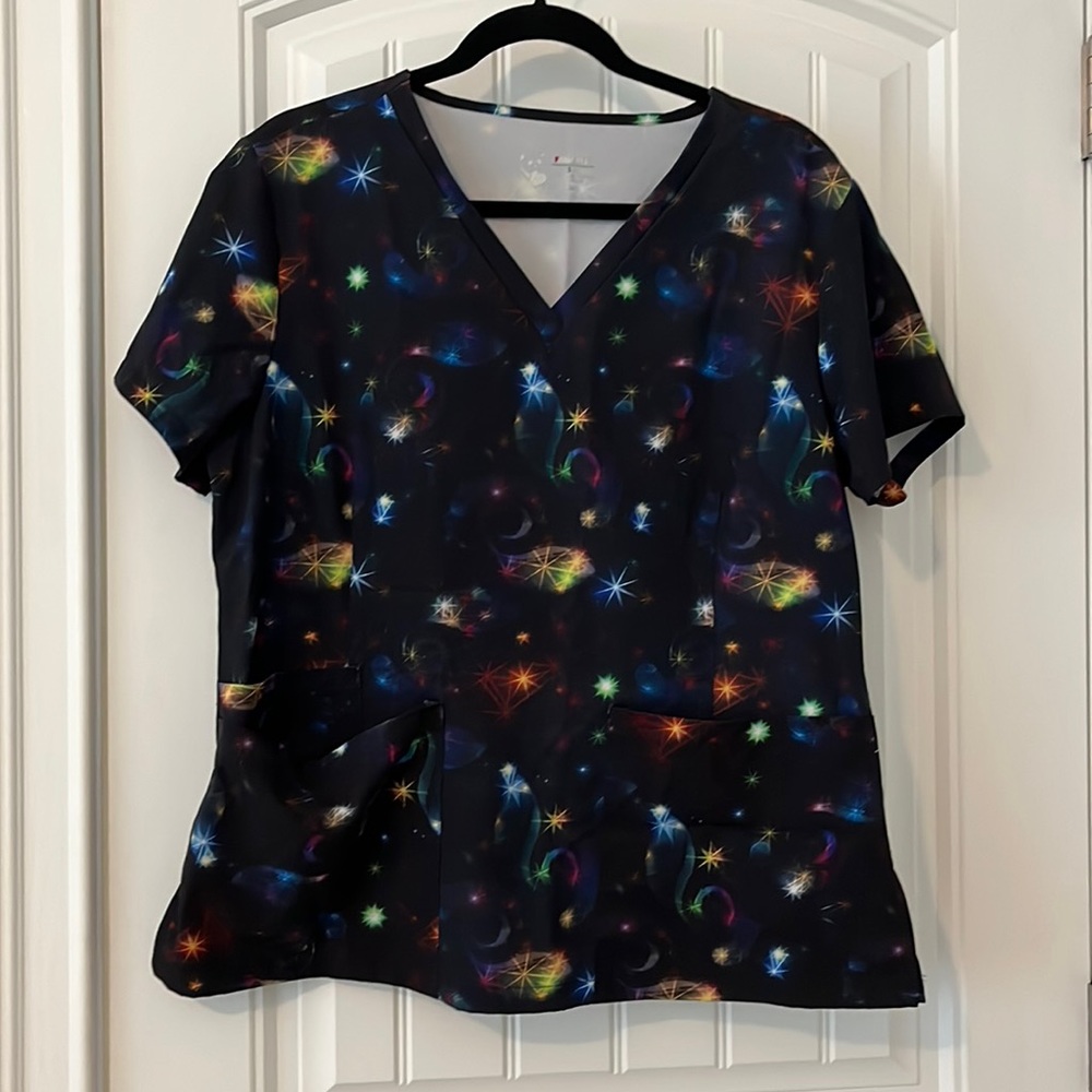 Large scrub top. Worn but still has some life left.